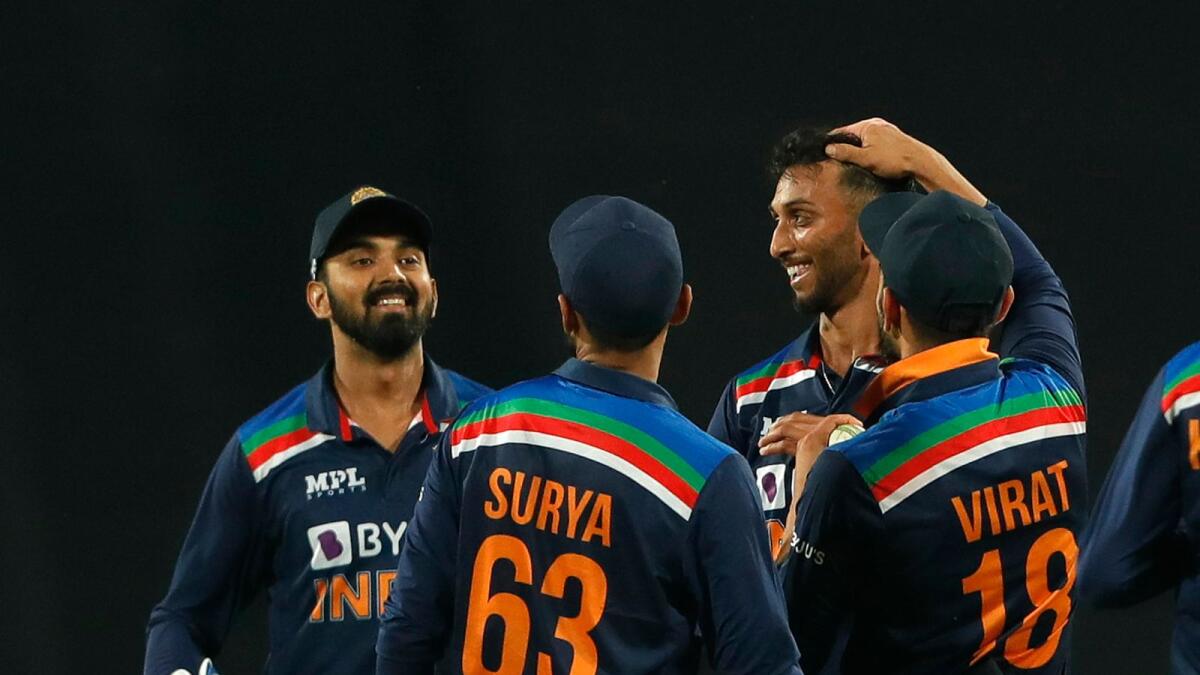 Prasidh Krishna of India celebrates the wicket of England's Sam Billings with captain Virat Kohli and other teammates. (BCCI)