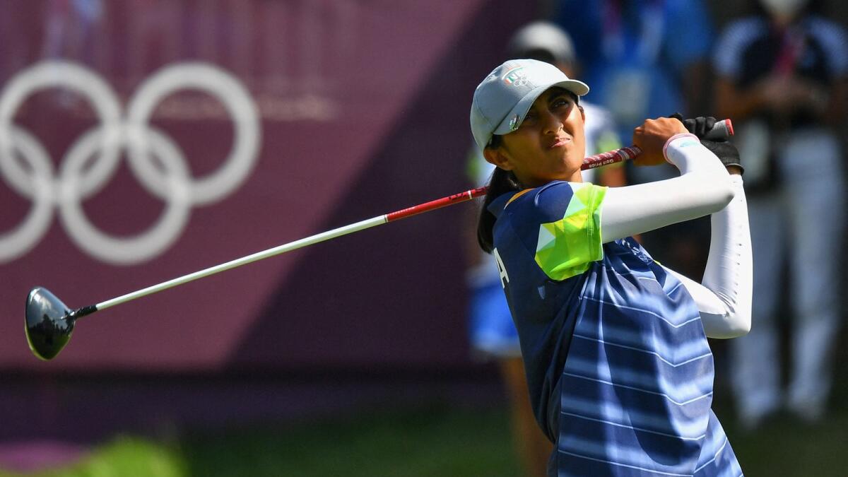 India's Aditi Ashok watches her drive from the first tee in Round 3 of the women's golf individual stroke play at the Tokyo Olympic Games. (AFP)