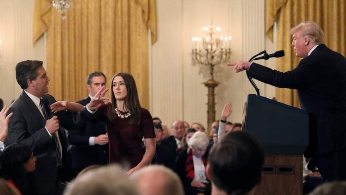 White House restores CNN reporter Acostas press pass