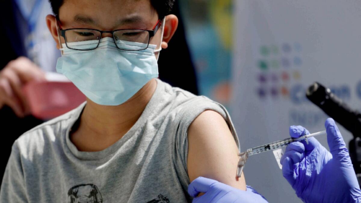 A person receives Pfizer-BioNTech vaccine in New York. — Reuters