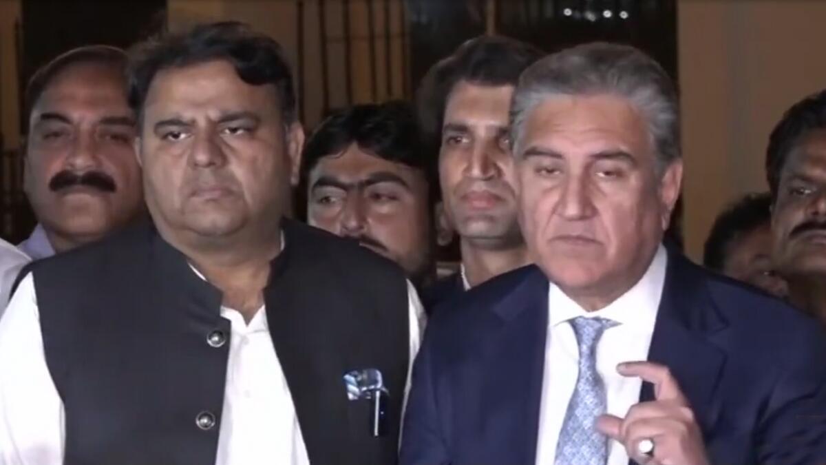 PTI leaders Fawad Chaudhry and Shah Mahmod Qureshi address the media after the first round of talks.