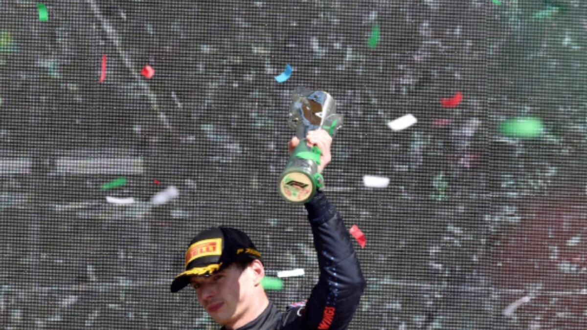 Red Bull's Dutch driver Max Verstappen celebrates on the podium after winning the Formula One Mexico Grand Prix. — AFP