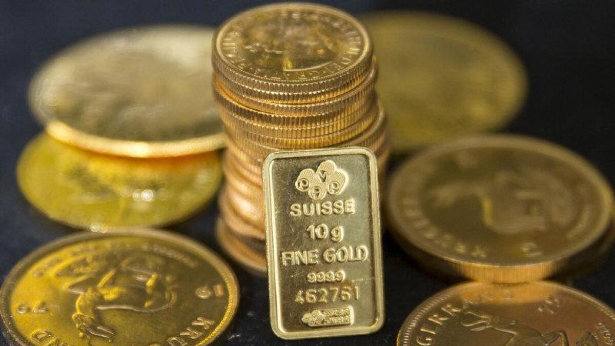 Spot gold was little changed at $1,792.79 per ounce. - Reuters