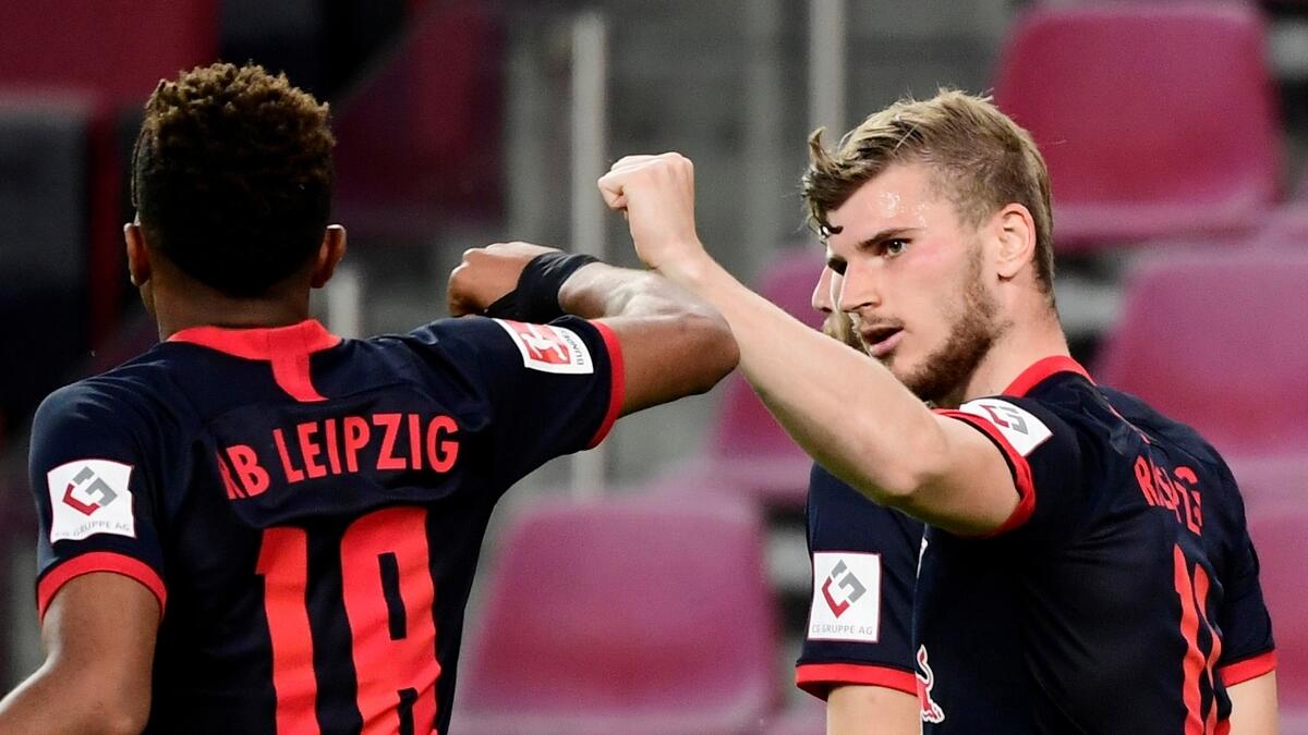 RB Leipzig's Timo Werner celebrates scoring a goal with Christopher Nkunku,(Reuters)