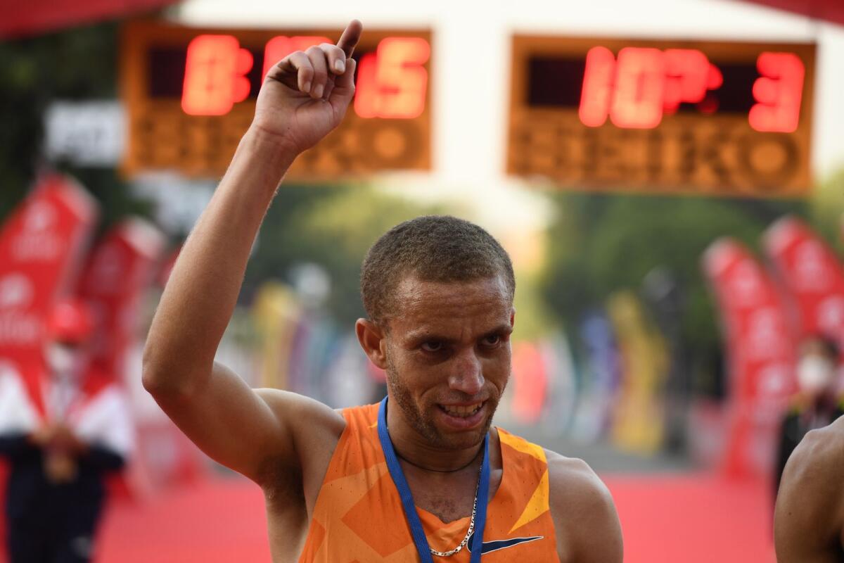 Ethiopian athlete Amedework Walelegn celebrates after winning the men's 2020 Delhi Half Marathon on November 29, 2020. (AFP file)