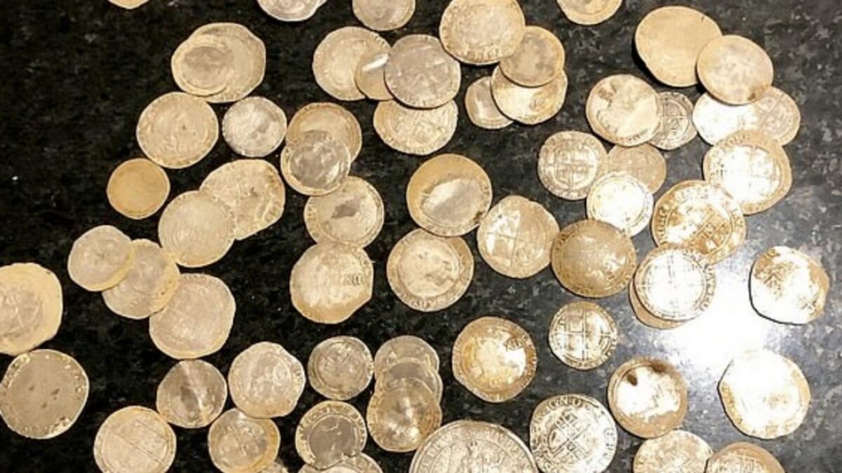 gold coins, Dh471,000, unearths, man, wedding ring, farm, northern ireland, gold