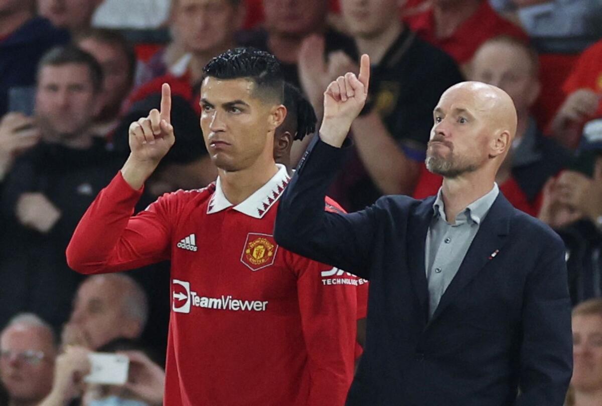 Manchester United's Cristiano Ronaldo with manager Erik ten Hag before coming on as a substitute. (Reuters)