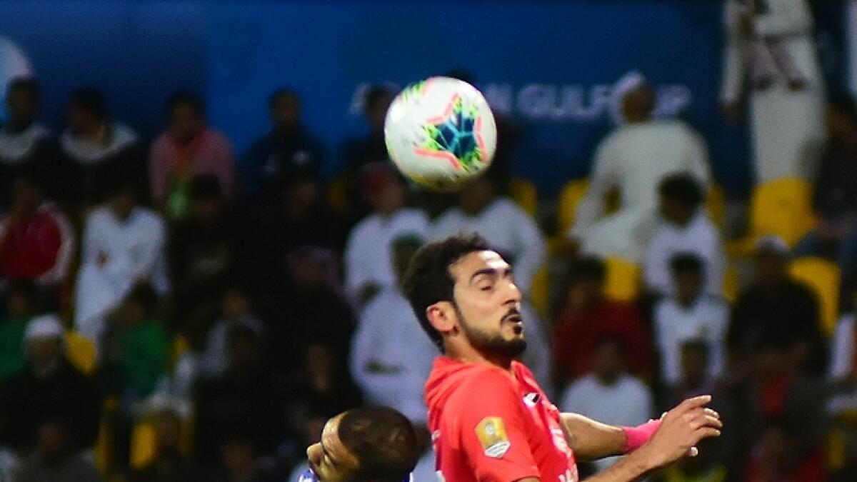Mohammed Khamis Obaid of Al Nasr and Yousef Jaber Naser of Shabab Al Ahli in action during the final match.