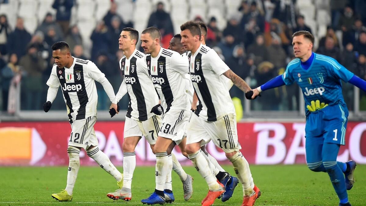 Juventus pile misery on Roma