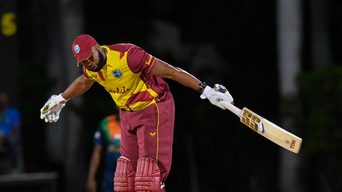 Kieron Pollard of West Indies celebrates hitting 6 sixes off Akila Dananjaya of Sri Lanka during a T20 match in Antigua and Barbuda. Photo: AFP