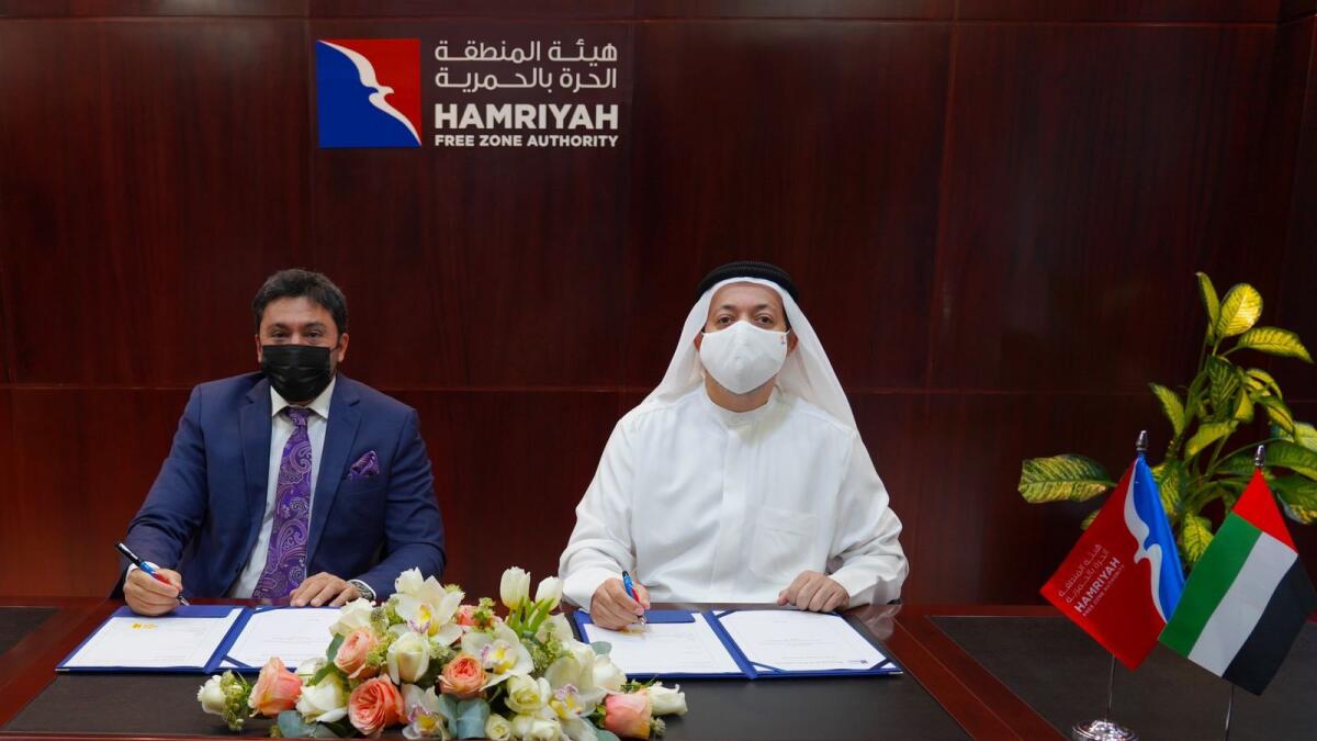 Saud Salem Al Mazrouei, director of the Hamriyah Free Zone Authority, and Nima Niknejad, managing director of Valor International FZC, digned the agreement at HFZA headquarters in the presence of senior officials from both sides. — Supplied photo