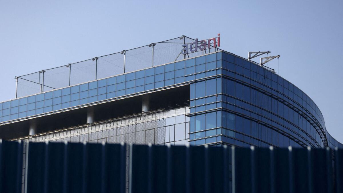 A logo of the Adani Group is seen on a commercial complex in Mumbai. - Reuters