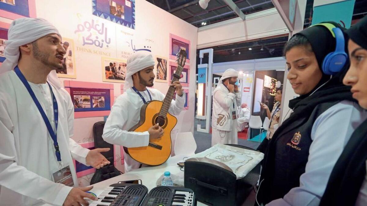 Hertz Design booth of Al-Ma'ali International Private School-Abu Dhabi showcases a piano with Braille letters that helps the visually impaired to play music.