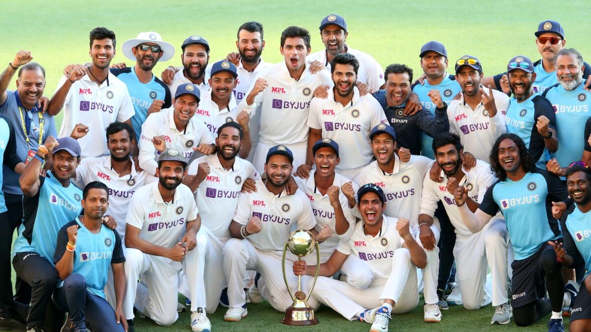 The injury-hit Indian team celebrate their epic Test series win in Australia. (Reuters)