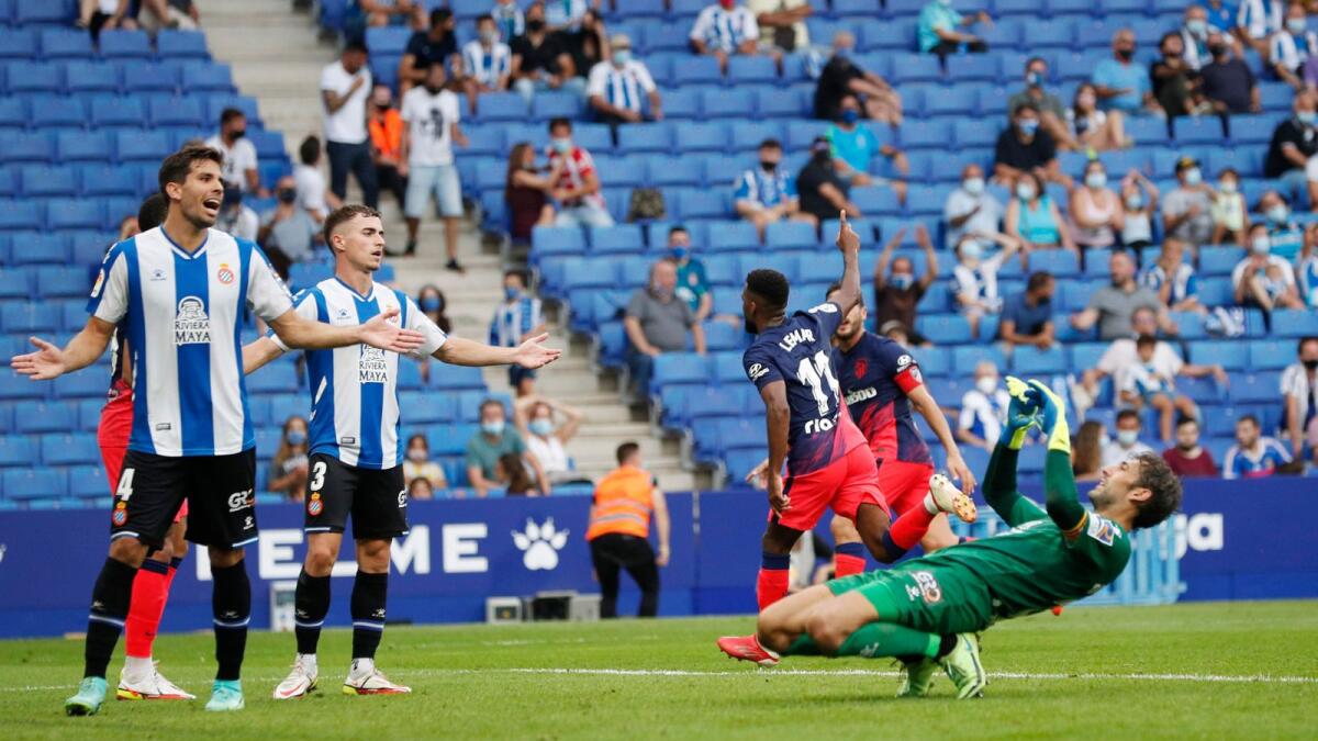 Atletico Madrid's Thomas Lemar celebrates his goal against Espanyol. — Reuters