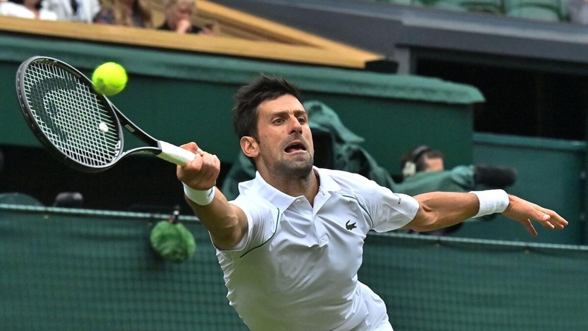 Novak Djokovic plays a forehand return to Kevin Anderson. (AFP)