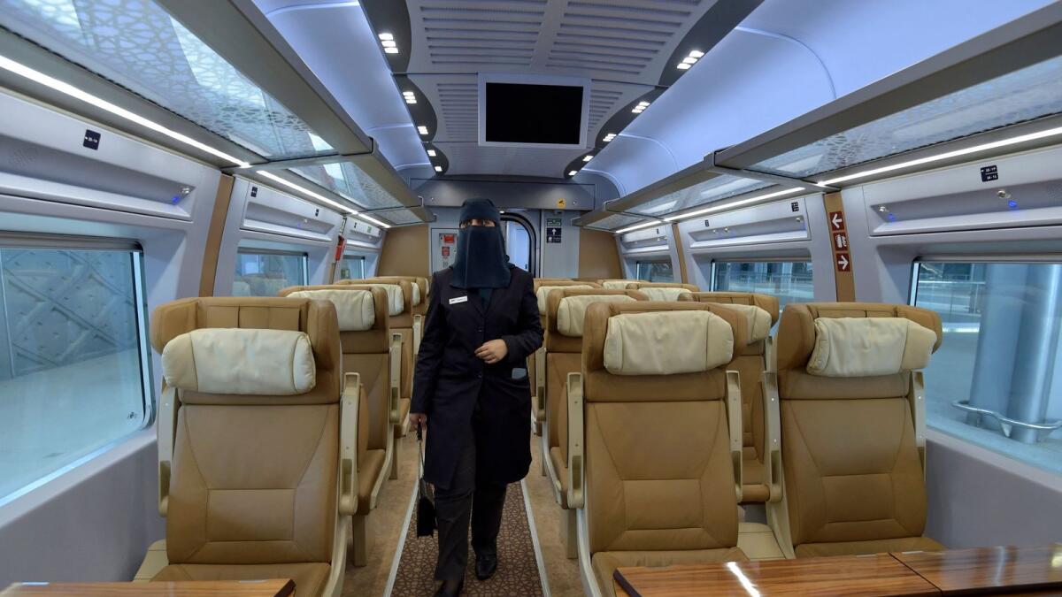 Tharaa Ali is pictured in one of the wagons of a high-speed train ferrying pilgrims to holy city of Makkah in Saudi Arabia's Red Sea coastal city of Jeddah, on January 22, 2023. — AFP
