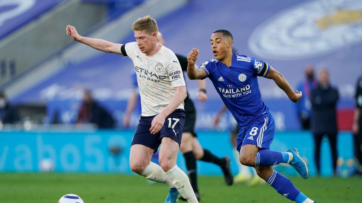 Manchester City's Kevin De Bruyne in action with Leicester City's Youri Tielemans. — Reuters