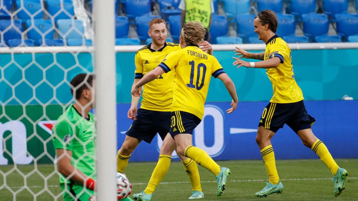 Sweden's Emil Forsberg celebrates after scoring his side's second goal against Poland. (AP)
