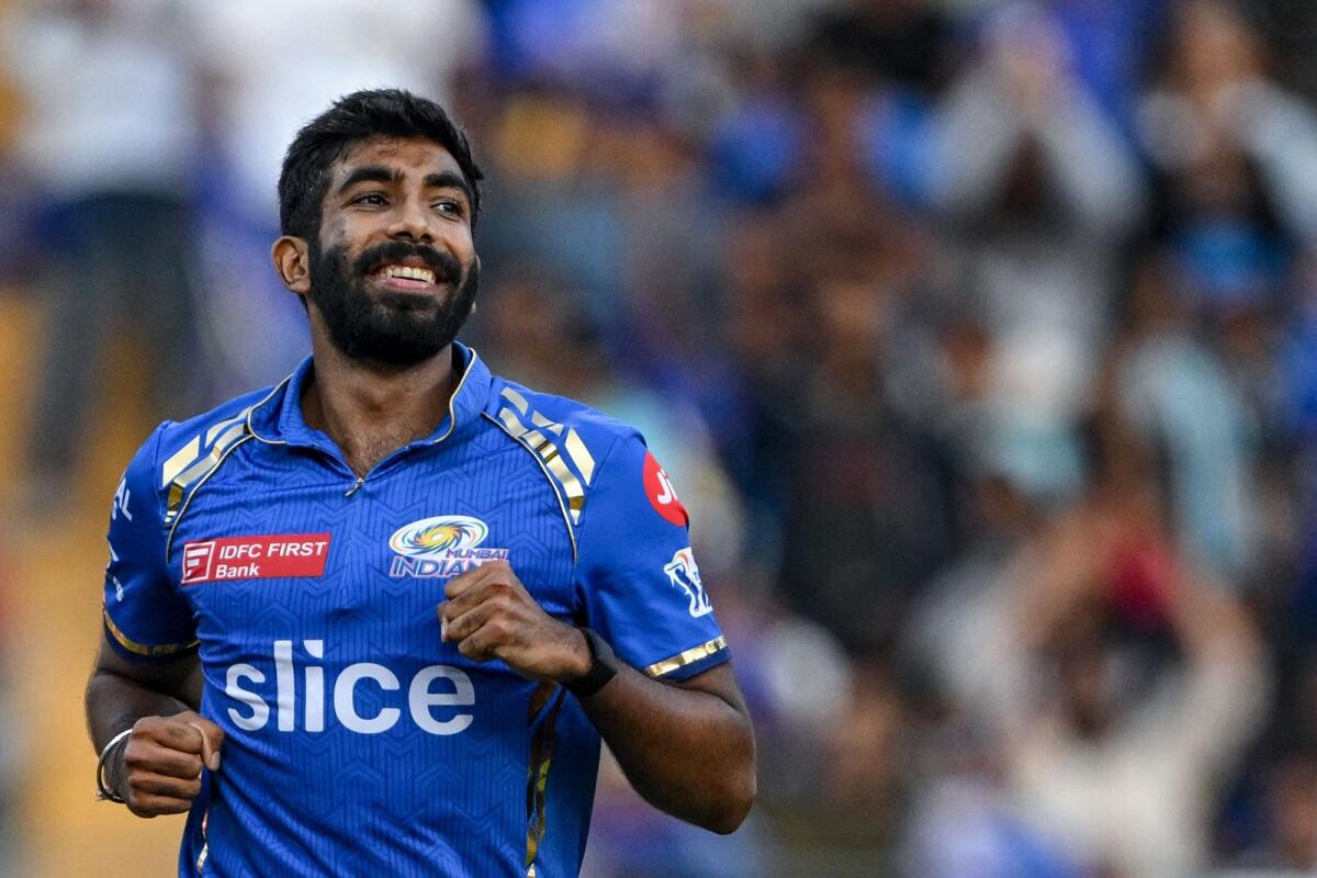 Mumbai Indians' Jasprit Bumrah became the first bowler to take five wickets in an innings against RCB in the IPL history. - AFP