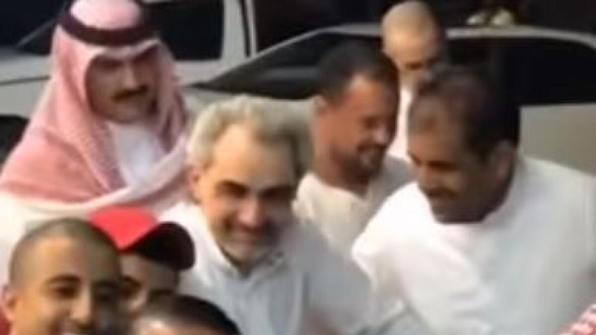 Video: Saudi billionaire Prince Alwaleed rides bicycle to buy groceries