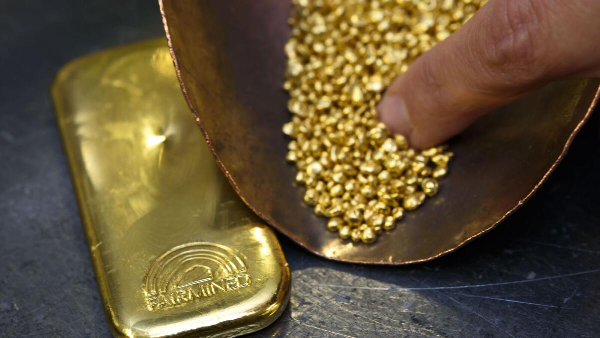 Gold up for second day as dollar pulls back