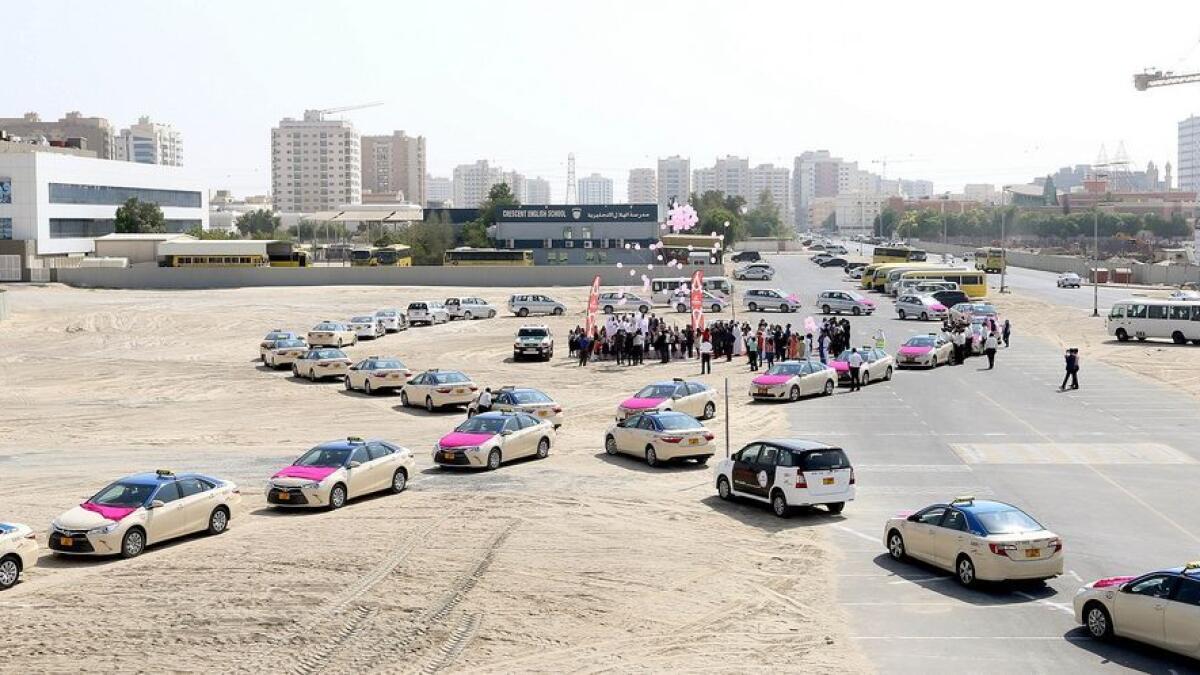 Hundreds of taxis form giant pink ribbon in UAE