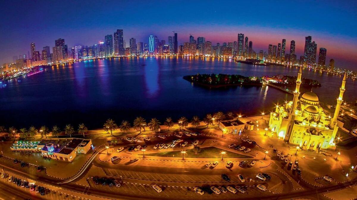 A bird's-eye view of Khalid Lagoon at Buhaira Corniche in Sharjah. Seen on the right is the  iconic Al Noor Mosque, which is of Turkish Ottoman design. Behind the mosque is Al Noor Island, which has a butterfly garden  surrounded by trees, plants and flowers. Photo by M. Sajjad