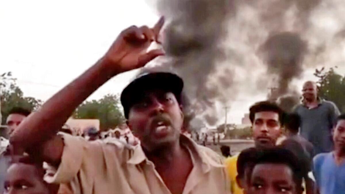 People gather during a protest in Khartoum, Sudan. – AP