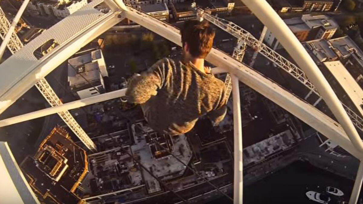 Watch: Daredevil hangs from crane on top of Dubai tower
