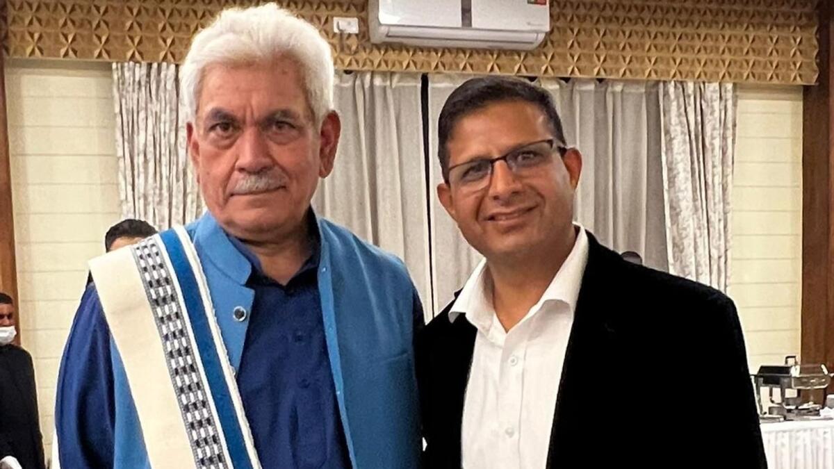 Lt Governor Manoj Sinha (left) and Bal Krishen, Chiramn and CEO, Century Financial Consultancy. Supplied photo