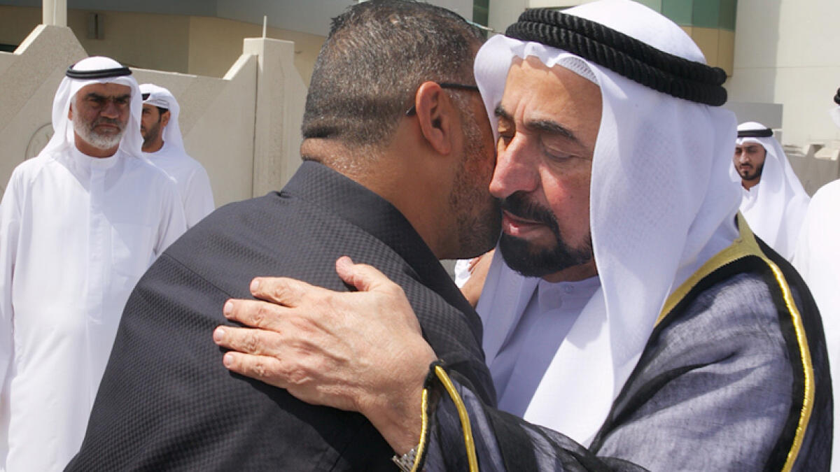 Dr Shaikh Sultan at mourning tent of Obaida Al Aqrabawi in Sharjah’s industrial area. - Wam