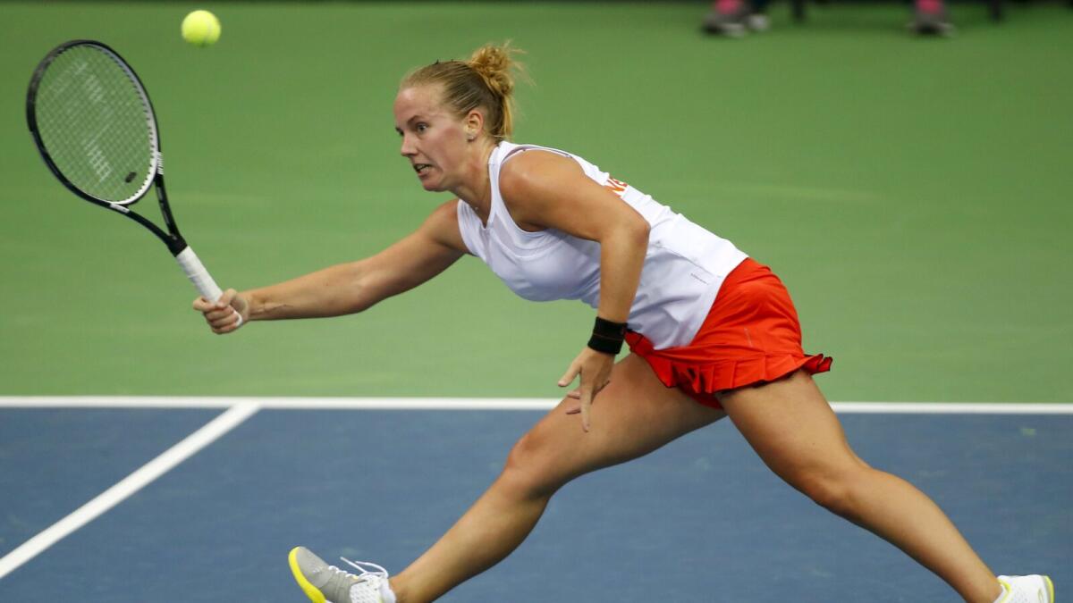 Dutch shock Russians to enter Fed Cup semis