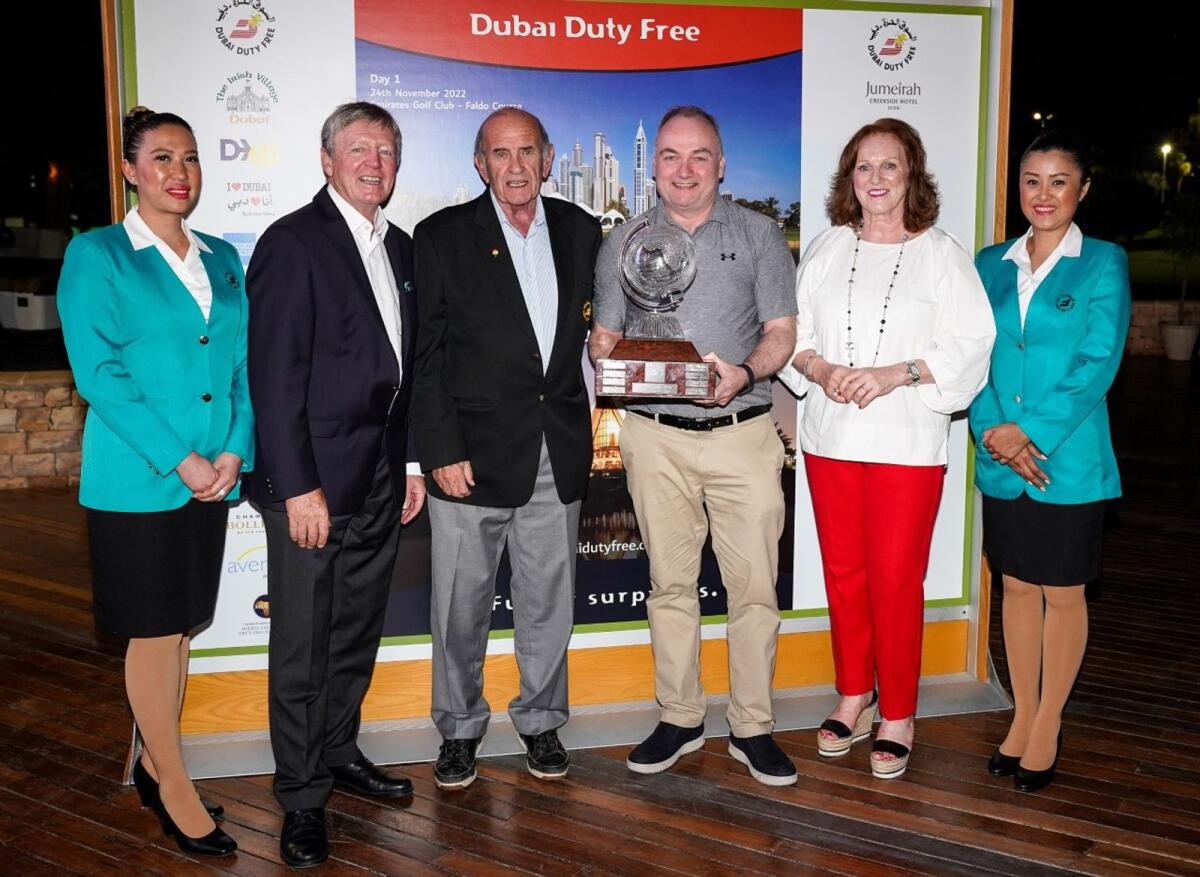Dermot Davitt (third from right), poses with the trophy along with Colm McLoughlin, Executive Vice Chairman &amp; CEO of Dubai Duty Free (third from left). — Supplied photo