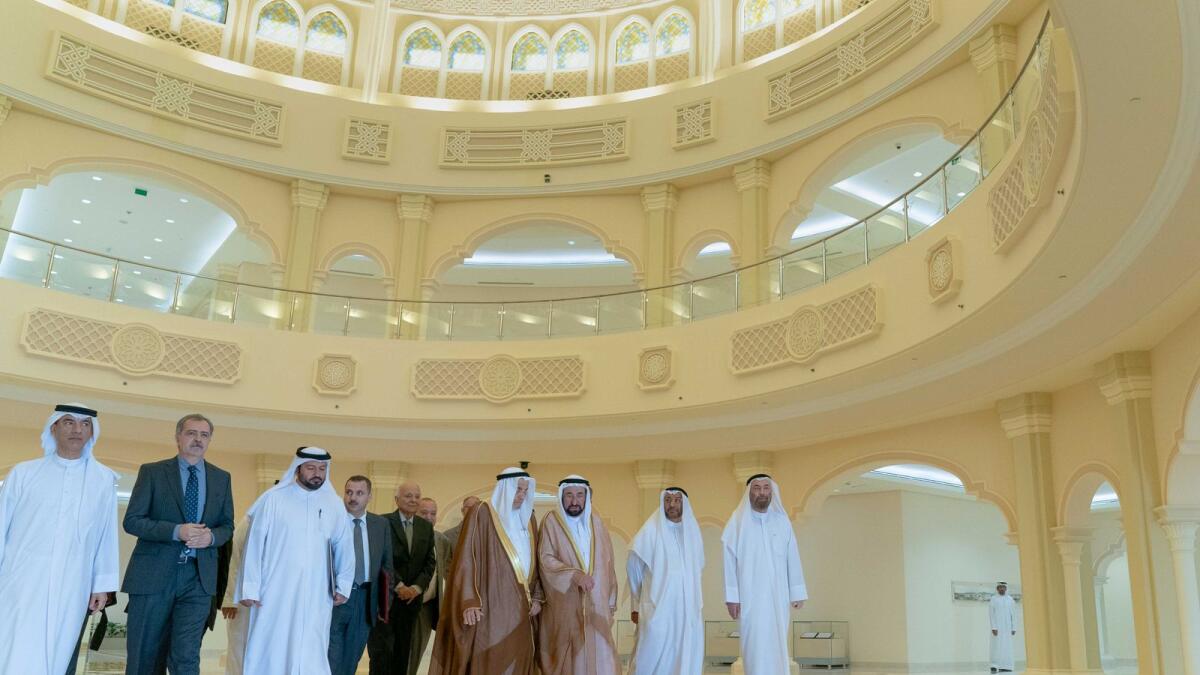Sharjah Ruler with the officials and winners of the Alesco-Sharjah Award for Language and Lexical Studies. — Supplied photo