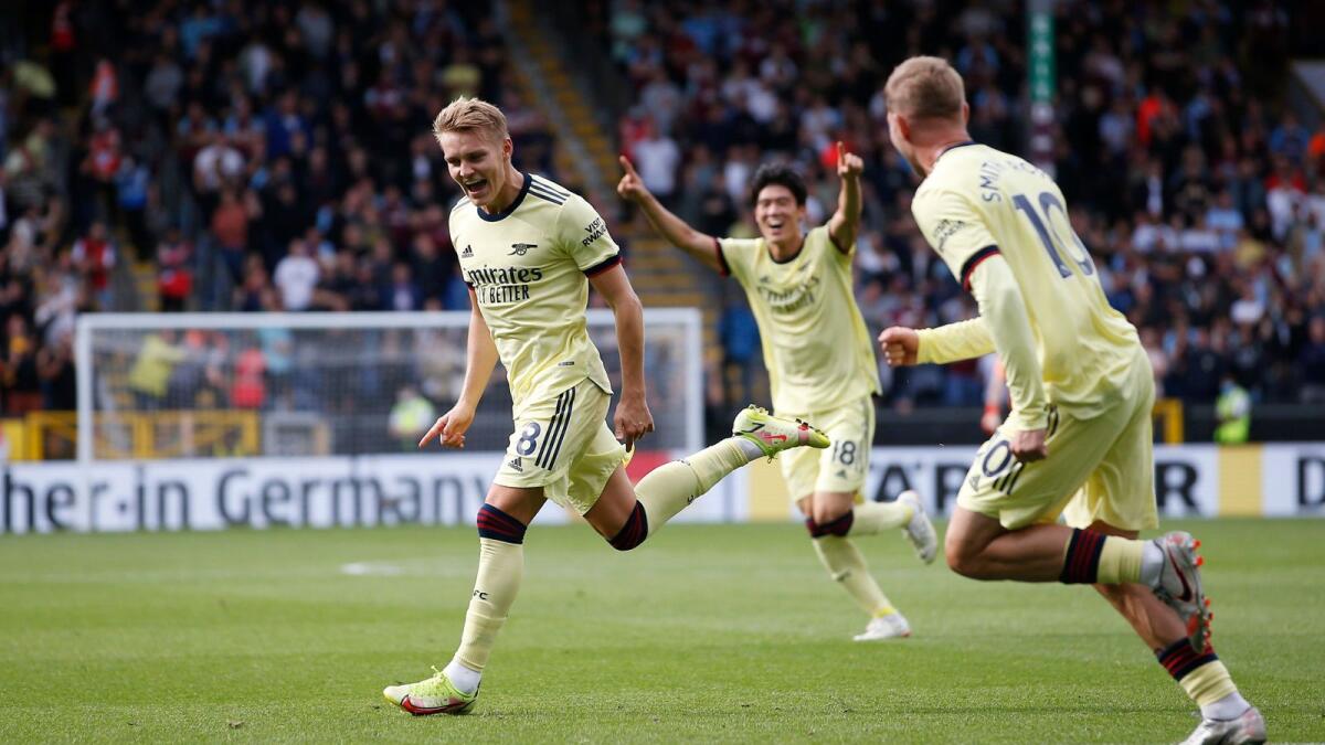 Arsenal's Martin Odegaard celebrates his goal against Burnley. — Reuters