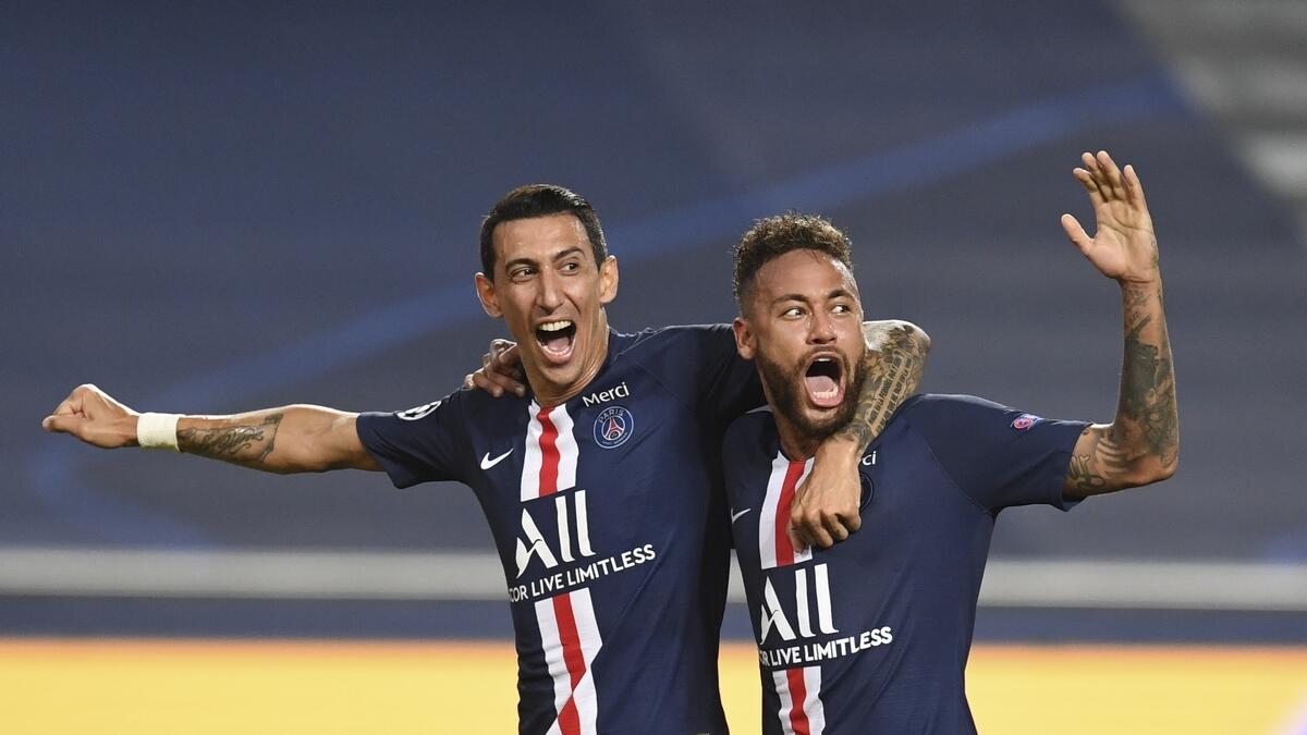 PSG's Angel Di Maria celebrates after scoring  a  goal against RB Leipzig with his teammate Neymar