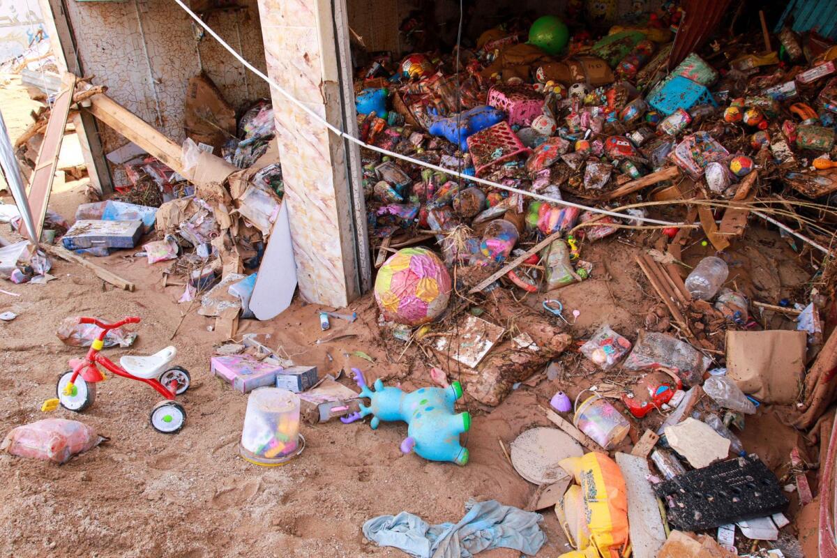 Toys are seen in a flash flood damaged shop in Derna, eastern Libya, on September 11, 2023.