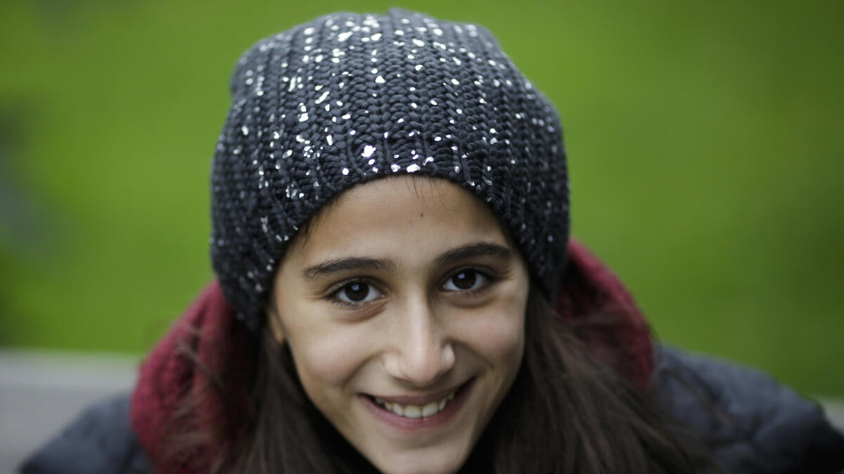 Syrian refugee Raghad Habashieh poses for a photo during an interview with the Associated Press at a park in Pirna, Germany. (AP Photo)