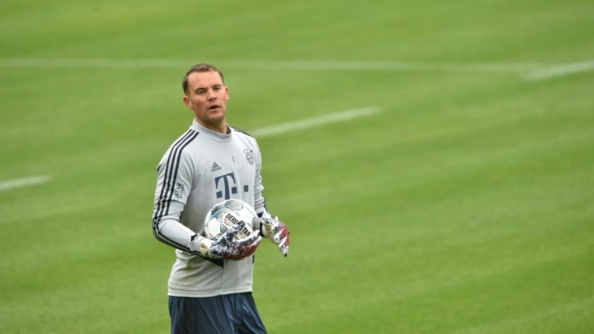 Manuel Neuer, Bayern Munich goalkeeper and Germany captain, says Bundesliga footballers must be role models when the German league returns later in May. - AFP