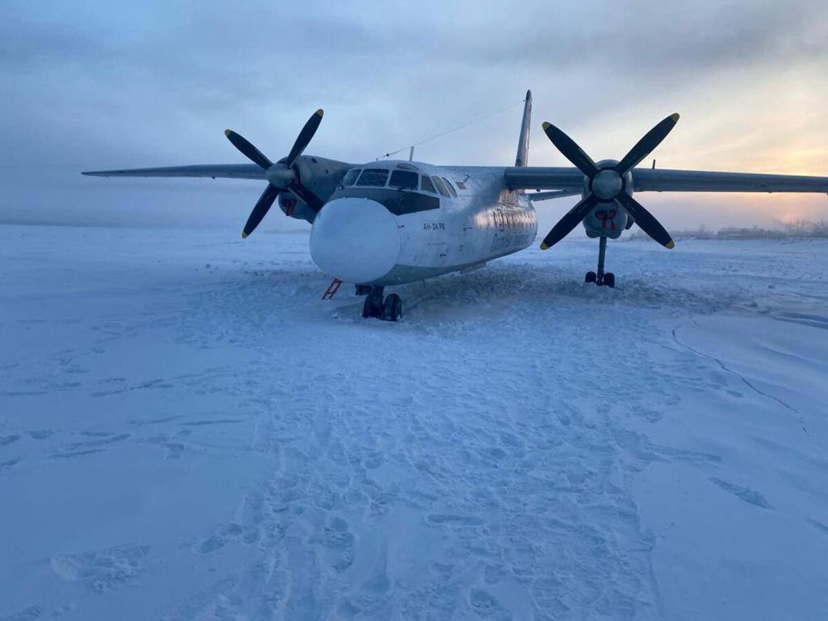 A view shows a Polar Airlines' Antonov-24 passenger aircraft following its landing on the Kolyma river near an airport in Zyryanka in the Yakutia region, Russia, on Thursday. — Reuters