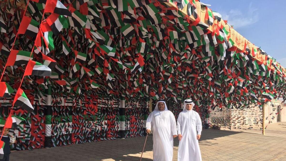 Watch: Emiratis 30,000 flags home decoration on National Day