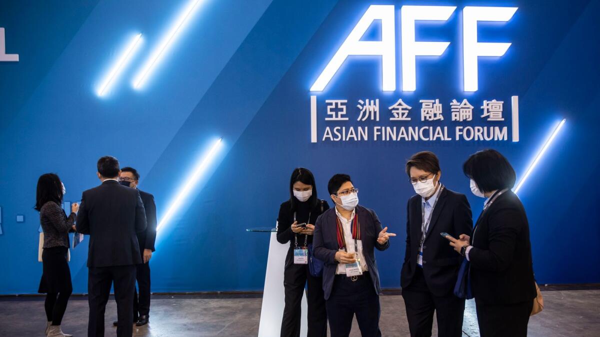 People attend the Asian Financial Forum in Hong Kong on Wednesday. - AFP