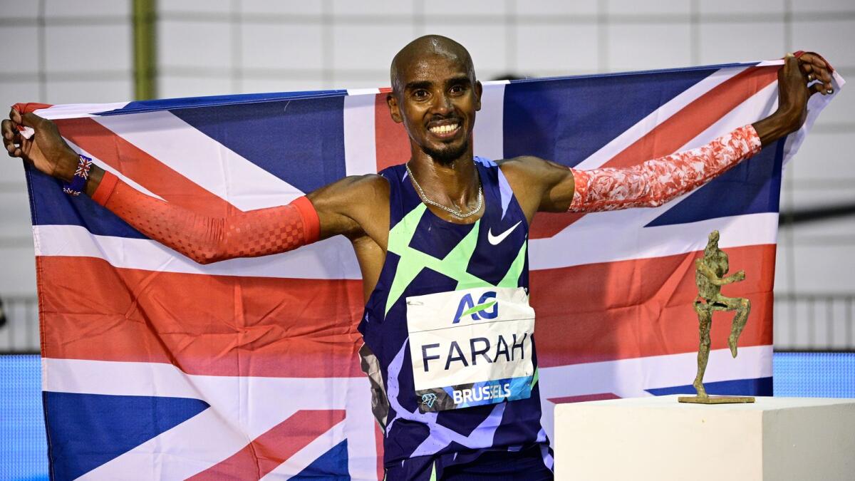 Mo Farah was knighted by Queen Elizabeth II in 2017 after he completed the 5,000m and 10,000m double at both the London 2012 and Rio 2016 Olympics. (AFP file)