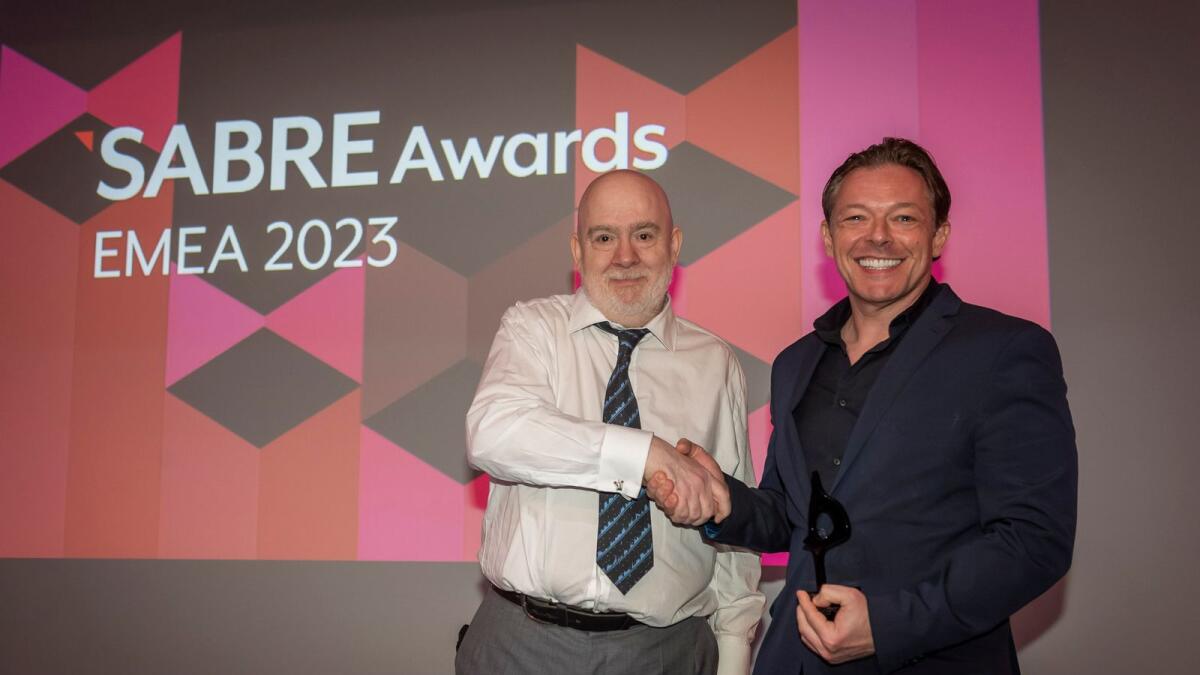 Rami Halwani, Executive Vice President for Client Services at ASDA’A BCW, receives the ‘Middle East Consultancy of the Year’ 2023 SABRE EMEA award from Paul Holmes, Founder of PRovoke Media, at a ceremony held in Frankfurt. - Supplied photo