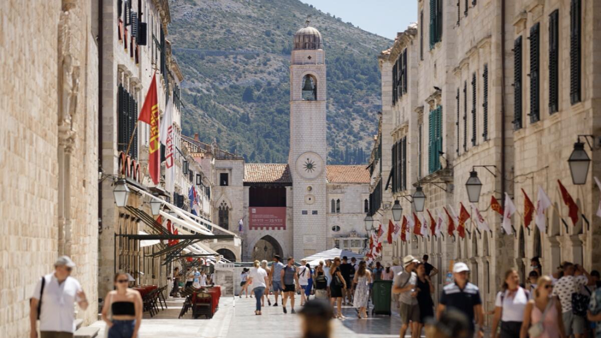Tourists are seen at Stradun street in Dubrovnik, amid the spread of the coronavirus disease (Covid-19), Croatia. Photo: Reuters