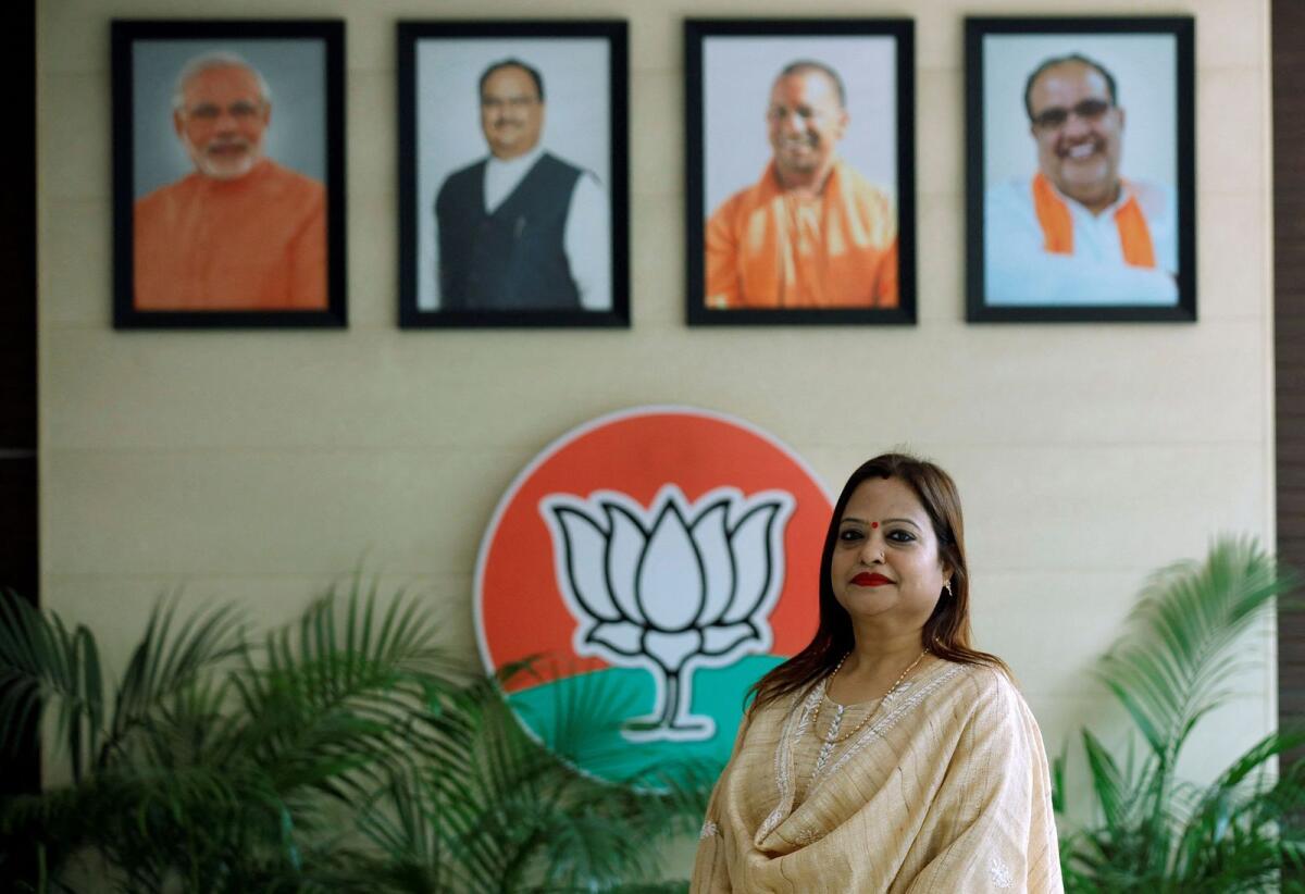 Ranika Jaiswal, a treasurer in Uttar Pradesh women's wing of India's ruling Bharatiya Janata Party, poses for a photograph inside the party's office in Lucknow, on Tuesday. — Reuters
