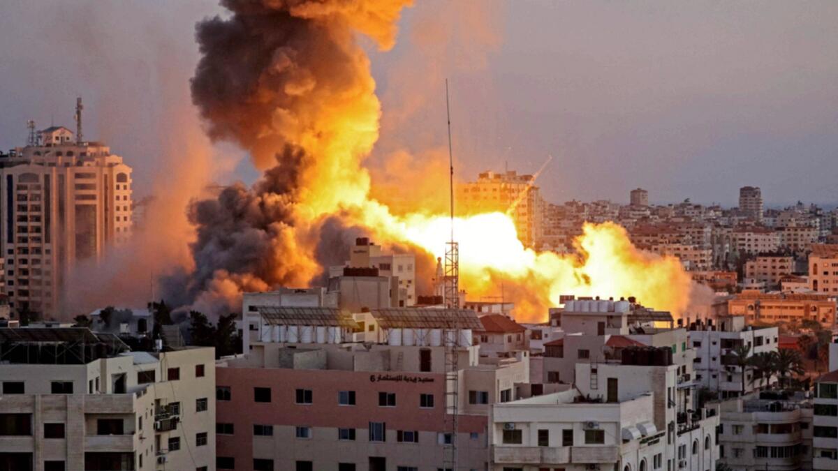 Smoke billows after an Israeli airstrike on Gaza City targeted the Ansar compound. — AFP
