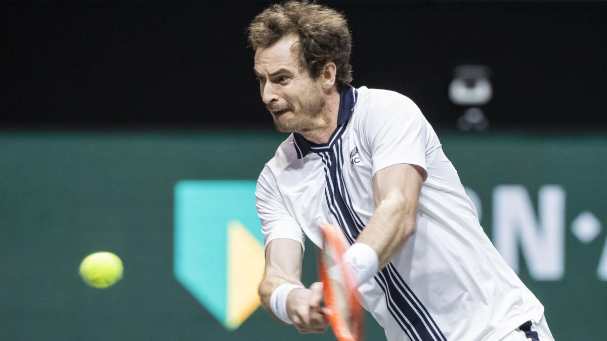 Britain's Andy Murray plays a return to Russia's Andrey Rublev. (AFP)