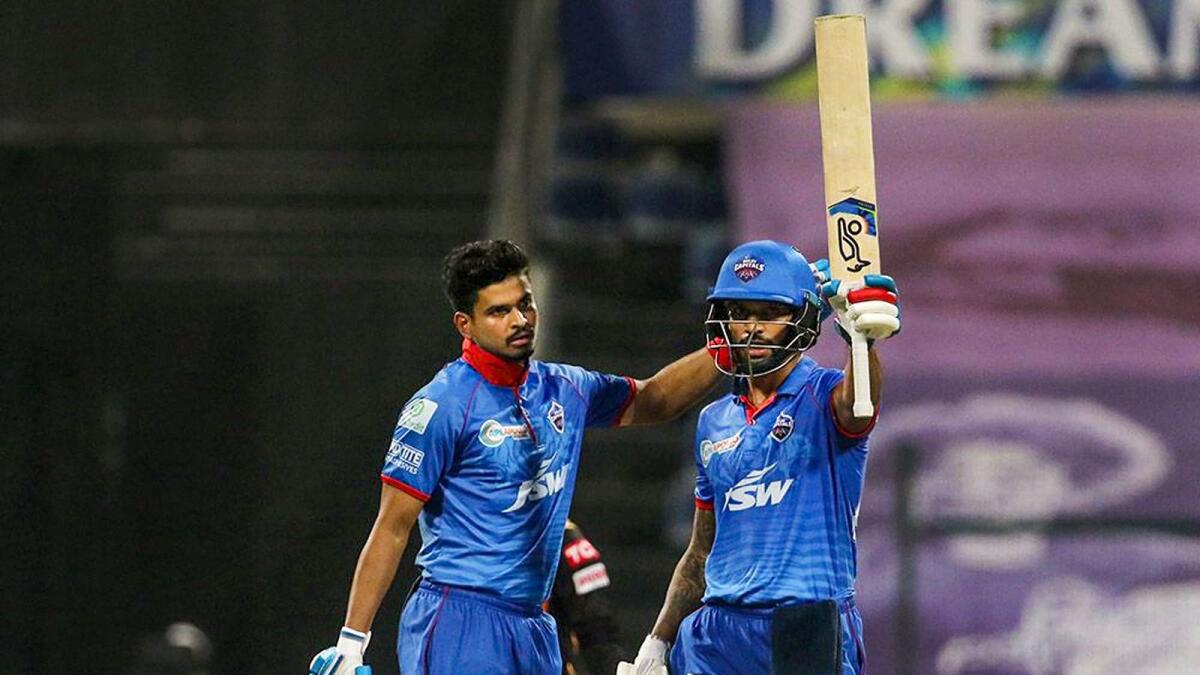 Shikhar Dhawan of Delhi Capitals raises his bat after scoring fifty during Indian Premier League match against Sunrisers Hyderabad. — IPL